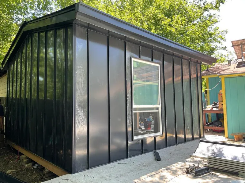 Black standing seam metal wall panels for Roof Inspection in Imperial